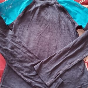 Athletic outfit, includes top and bottom.